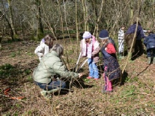 Children Coppicing Hazel