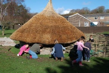 Daubing a Roundhouse in school grounds