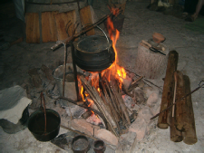Cooking pot hanging over a fire
