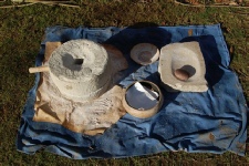 Grinding wheat into flour in school grounds